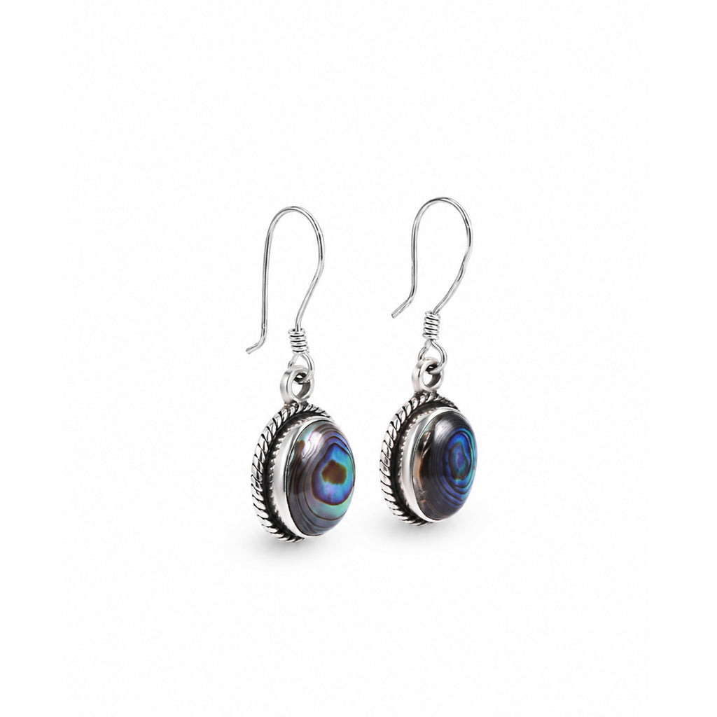 Elegant silver earrings with a shimmering shell stone and a soft modern design.