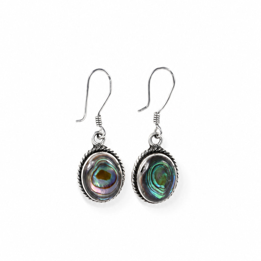 Elegant silver earrings with a shimmering shell stone and a soft modern design.