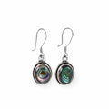 Elegant silver earrings with a shimmering shell stone and a soft modern design.