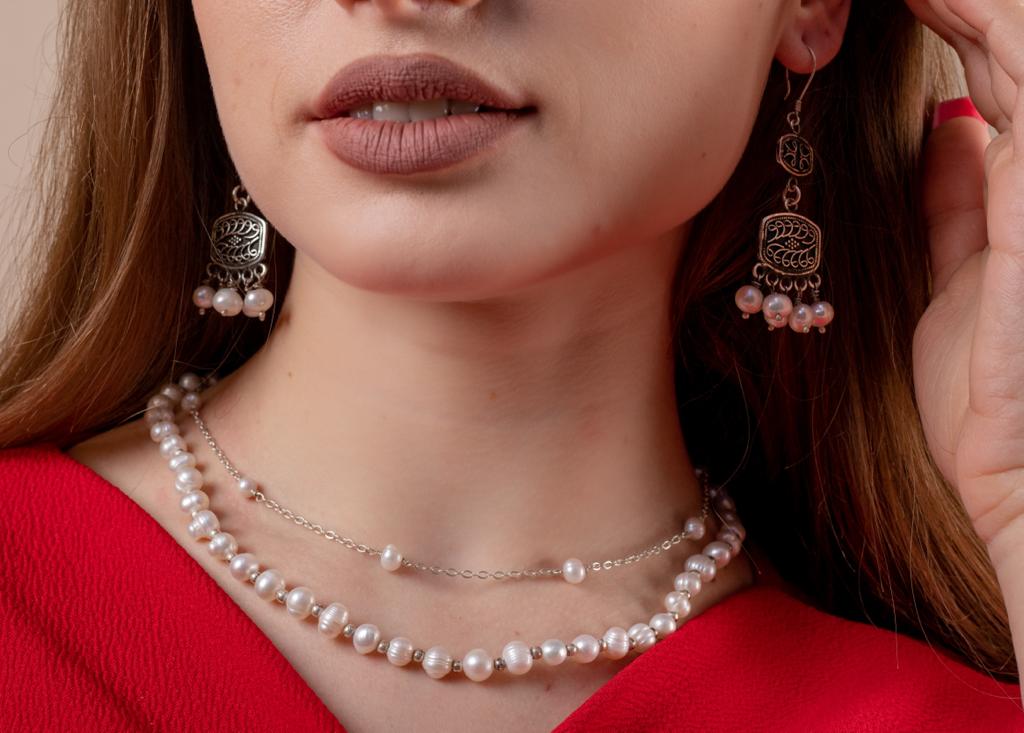 925 sterling silver earring studded with precious stones