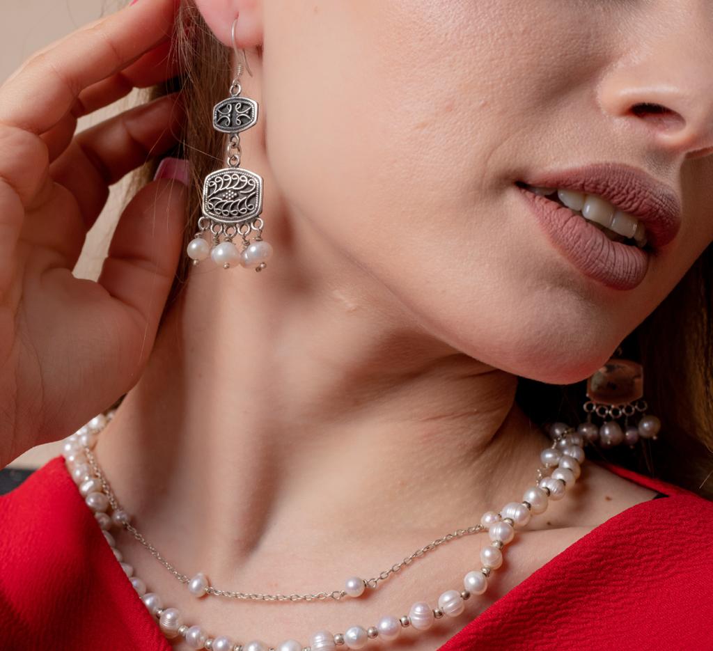 925 sterling silver earring studded with precious stones