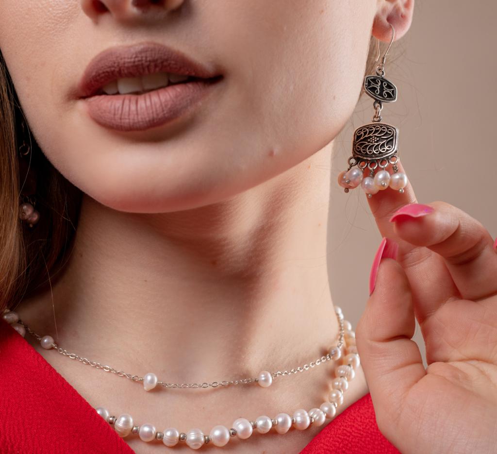 925 sterling silver earring studded with precious stones